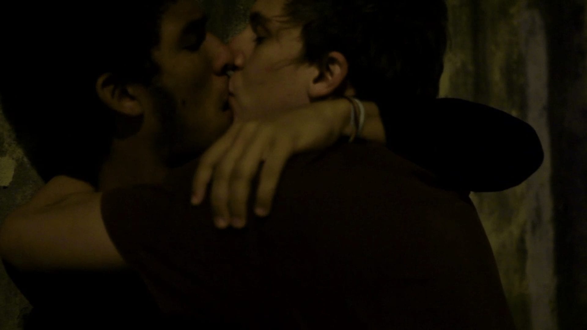 Two boys kissing on the streets of a city in Brazil from the short film Tuesday Overnight